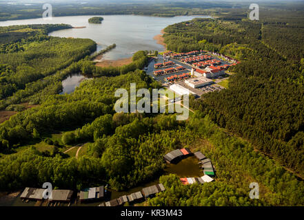 Marina holiday home Hafendorf Rheinsberg, lighthouse in the harbor, port houses, cottages with jetty at the Great Rheinsberger See, Rheinsberg, Meckle Stock Photo