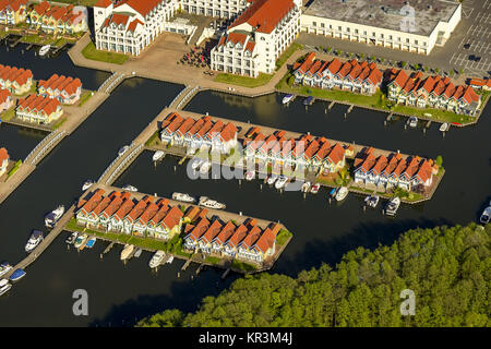 Marina holiday home Hafendorf Rheinsberg, lighthouse in the harbor, port houses, cottages with jetty at the Great Rheinsberger See, Rheinsberg, Meckle Stock Photo