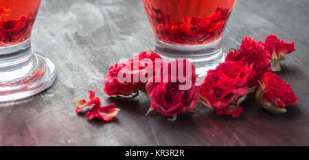 red drink and roses Stock Photo