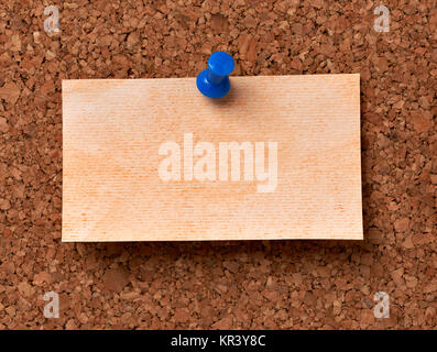 close up of note papers on a corkboard Stock Photo
