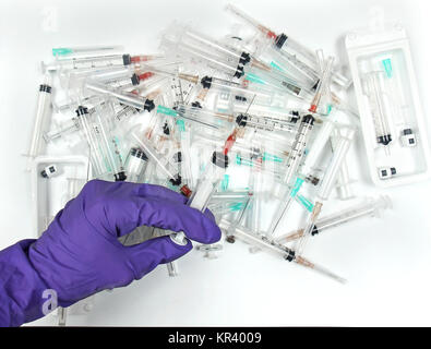 Hand syringes pile Stock Photo