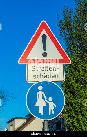 sign pothole (road damage) Stock Photo