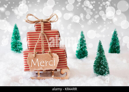 Label With French Text Merci Means Thank You. Red Christmas Decoration 