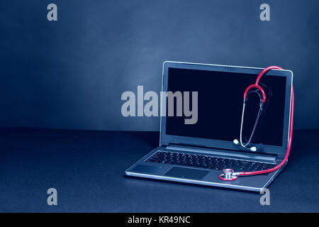 Stethoscope on the keyboard Stock Photo