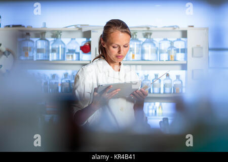 Portrait of a female researcher doing research in a biochemistry lab Stock Photo