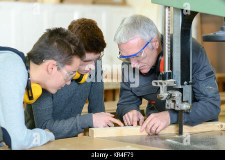 Woodwork apprenticeship Stock Photo