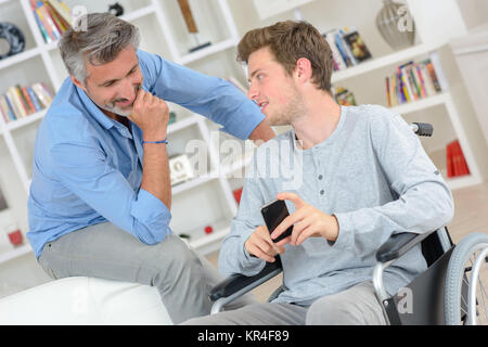 father and son conversation Stock Photo