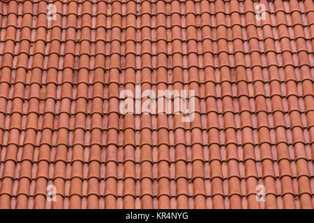 Closeup of the red clay roof tiles Stock Photo