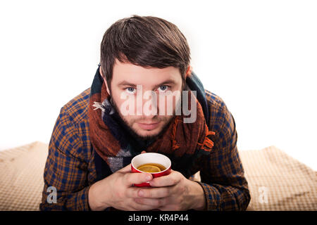 Handsome man drinking coffee. Isolated on white background Stock Photo