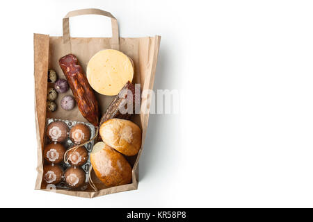 Food mix  inside a paper bag on the white background Stock Photo