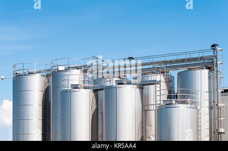 Stainless steel silos . For a milk processing plant. Stock Photo