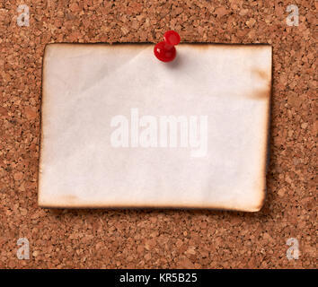 close up of note papers on a cork board Stock Photo