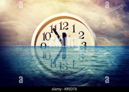 Clock, Five before Twelve, in the water, symbolic photo climate change, Uhr, Fünf vor Zwölf, im Wasser, Symbolfoto Klimawandel Stock Photo