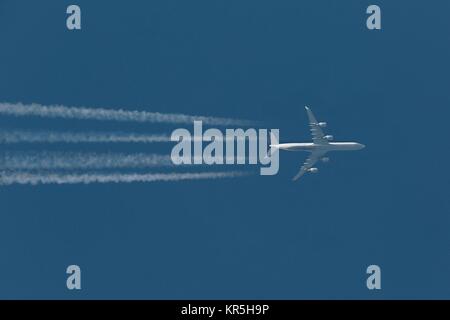 Plane at cruising altitude Stock Photo