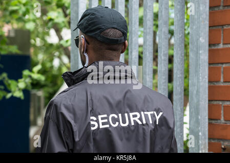 Rear View Of A Security Guard Stock Photo