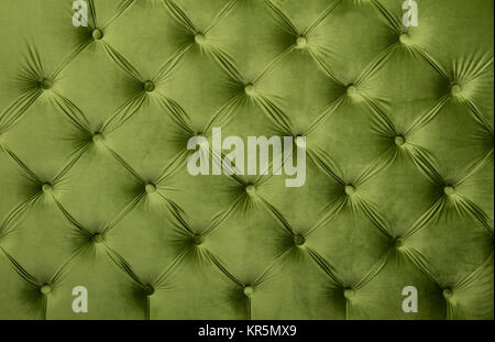 Green capitone tufted fabric upholstery texture Stock Photo