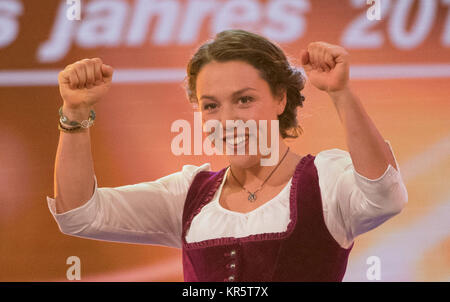 Biathlete Laura Dahlmeier stands onstage during the election to 'Athlete of the year' at the Kurhaus in Baden-Baden, Germany, 17 December 2017. Photo: Marijan Murat/dpa Stock Photo