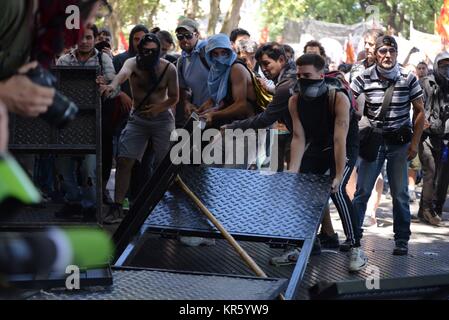 Int. 18th Dec, 2017. December 18, 2017; Argentina, Buenos Aires City.- Social, political, student and union organizations are repressed by police forces when the Pension Reform at Chamber of Deputies in the National Congress is debated. The Congress is fenced almost 200 metres around and with large amount of police. On Thursday, December 14, the session was canceled due to the repression unleashed outside the Congress. Credit: Credit: /ZUMA Wire/Alamy Live News Stock Photo