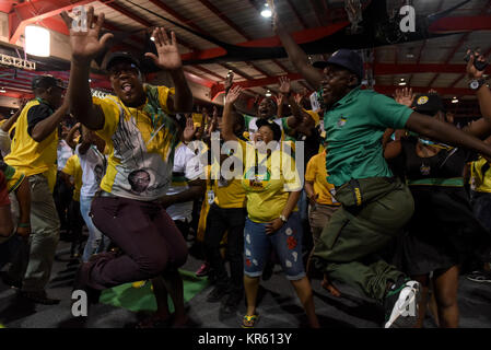 Johannesburg, South Africa. 18th Dec, 2017. South Africa's ruling party African National Congress (ANC)'s representatives celebrate at ANC's conference in Johannesburg, South Africa, on Dec. 18, 2017. South Africa's ruling party African National Congress (ANC) elected Cyril Ramaphosa on Monday to be the party's president for the next five years. Credit: Dave Naicker/Xinhua/Alamy Live News Stock Photo