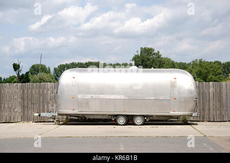 silver-colored caravan Stock Photo