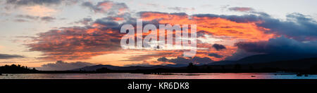 An amazing October sunrise at Loch Ba on Rannoch Moor in the Scottish Highlands. Stock Photo