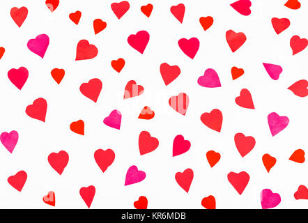 many pink and red hearts carved from paper Stock Photo