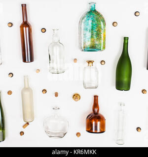 several glass bottles and corks on white Stock Photo