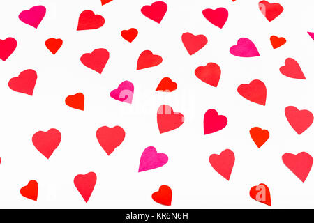 pink and red hearts cut out from paper on white Stock Photo