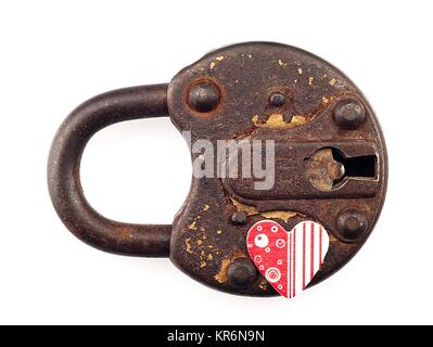 Rusty padlock and heart on a white background Stock Photo