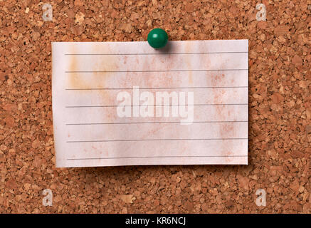 close up of note papers on a cork board Stock Photo
