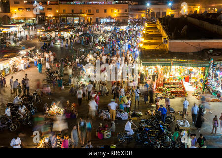 High angle view of bustling traditional North African market square in the evening. Stock Photo