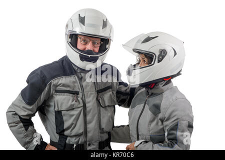 a couple senior riders with helmet isolated on the white background Stock Photo