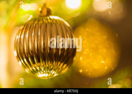 Christmas balls, traditional gold decorations for Christmas tree, gold and green combination, Czech republic Stock Photo
