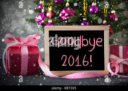 Christmas Tree With Rose Quartz Balls, Snowflakes And Bokeh Effect. Gifts Or Presents In The Front Of Cement Background. Chalkboard With English Text Goodbye 2016 For Happy New Year Stock Photo