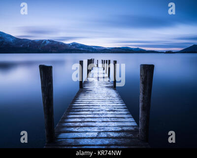 Ashness Jetty, Derwent Water, Lake District, England.  Long Exposure of this beautiful jetty looking over Derwent Water in Winter time. Stock Photo