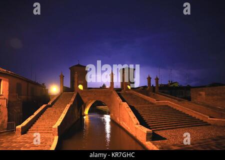 Night view of Trepponti or Ponte della Pallotta in Comacchio, Ferrara, Italy. June 14, 2017    Credit © Nuccio Goglia/Sintesi/Alamy Stock Photo Stock Photo