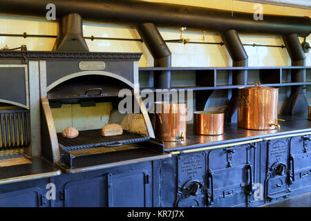 Old Wood Burning Stove in an Antique Kitchen Stock Photo