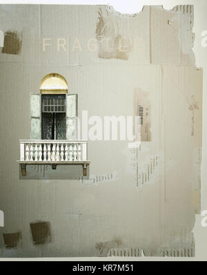 Cardboard as a background with an antique french window with balcony and shutter on it Stock Photo