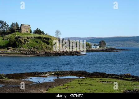 The ruins of 13th century Aros Castle on the Isle of Mull coast overlooking the  Sound of Mull. The castle was bulit by the MacDonalds clan,Scotland,B Stock Photo