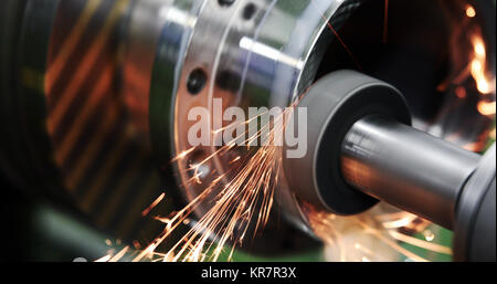 Finishing metal working on high precision grinding machine in workshop Stock Photo