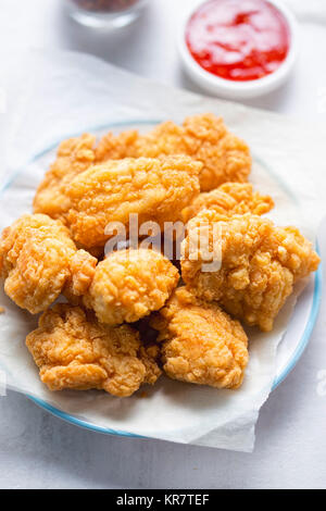 Chicken chunks with batter, sweet chilli dip Stock Photo