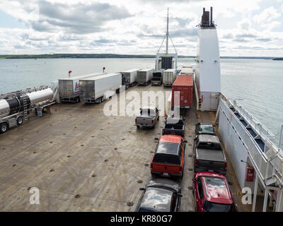 Trucks on deck, Blue Puttees ferry, North Sydney, Nova Scotia, Canada. Stock Photo