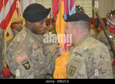 Command Sgt. Maj. Perry C. Williamson accepts the colors of the 59th ...