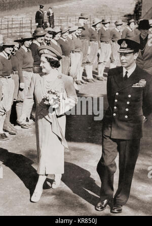 George VI and Queen Elizabeth inspecting members of the Women's Land Army in 1942 during WWII.  George VI, 1895 – 1952.  King of the United Kingdom and the Dominions of the British Commonwealth.   Queen Elizabeth, The Queen Mother.  Elizabeth Angela Marguerite Bowes-Lyon, 1900 – 2002.  Wife of King George VI and mother of Queen Elizabeth II. Stock Photo