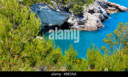 Summer sea coast near Architello (Arch) of San Felice on the Gargano peninsula in Puglia, Italy Stock Photo