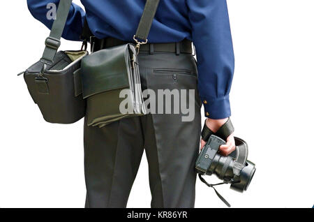 A photographer on assignment from editor.Prepares photographic material from the event. Stock Photo