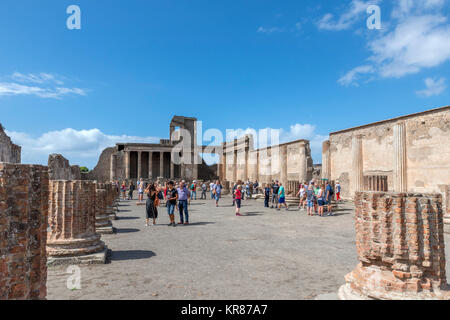 Tourists in the ruins of the Roman Forum at Pompeii ( Pompei ), Naples, Campania,Italy Stock Photo