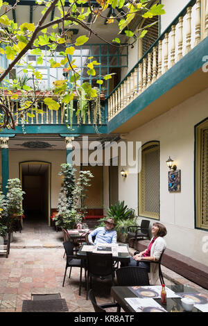 Ecuador cafe - a couple having a drink in a coffee house cafe, Cuenca, Ecuador South America Stock Photo