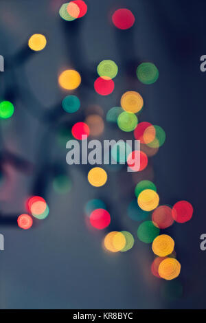 Blurred background with multicolored lights of garland Stock Photo