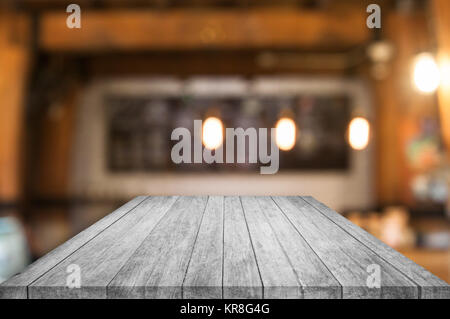 Perspective black and white wooden table top with coffee shop Stock Photo